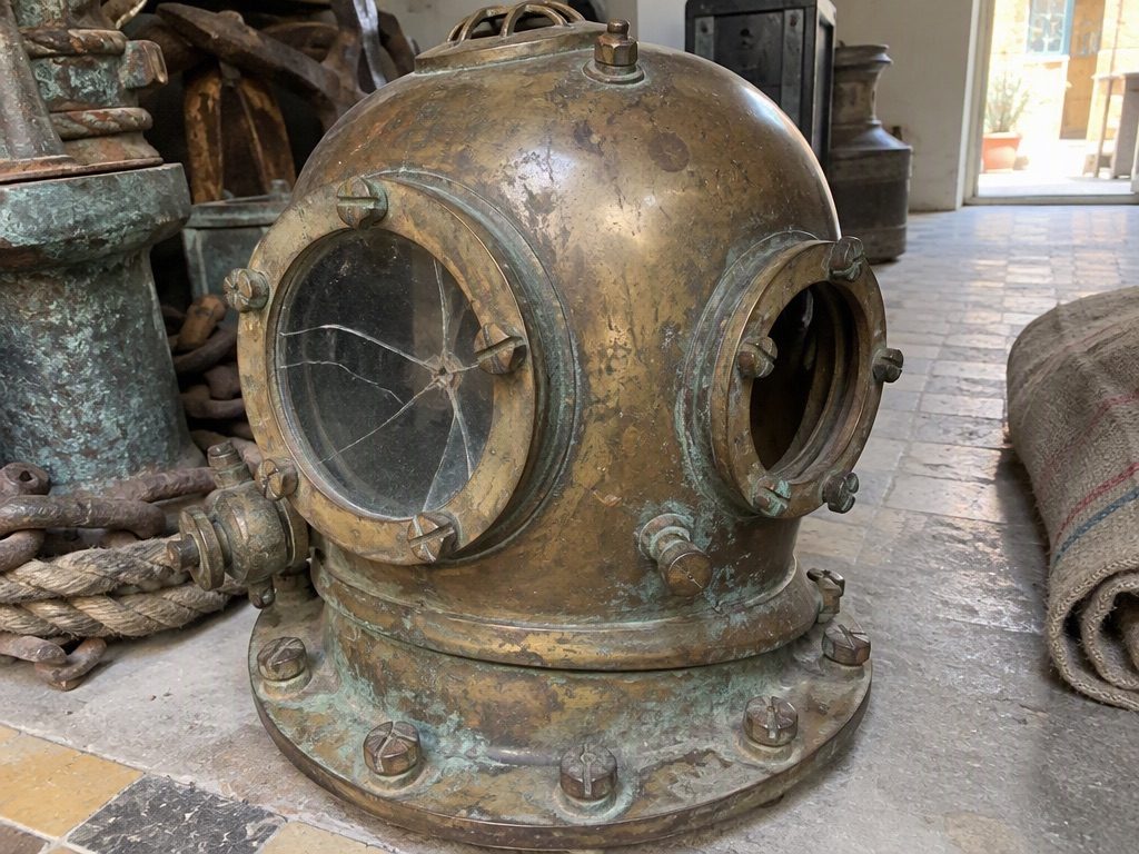 Brass diving helmet, reclaimed from harbour scrap