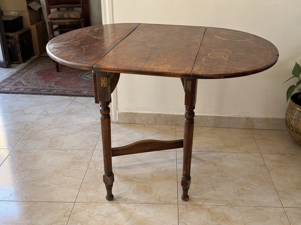 Walnut folding café table with turned legs